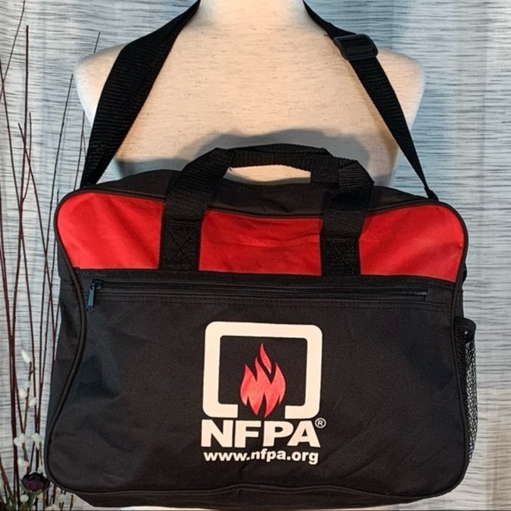 Leed’s red and black computer/book bag.